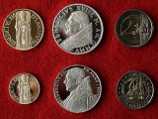             XVI