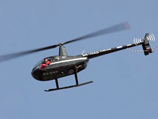          Robinson R-44,      