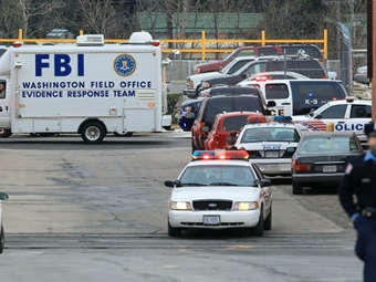 ФБР и полиция возле места происшествия. Фото ©AFP